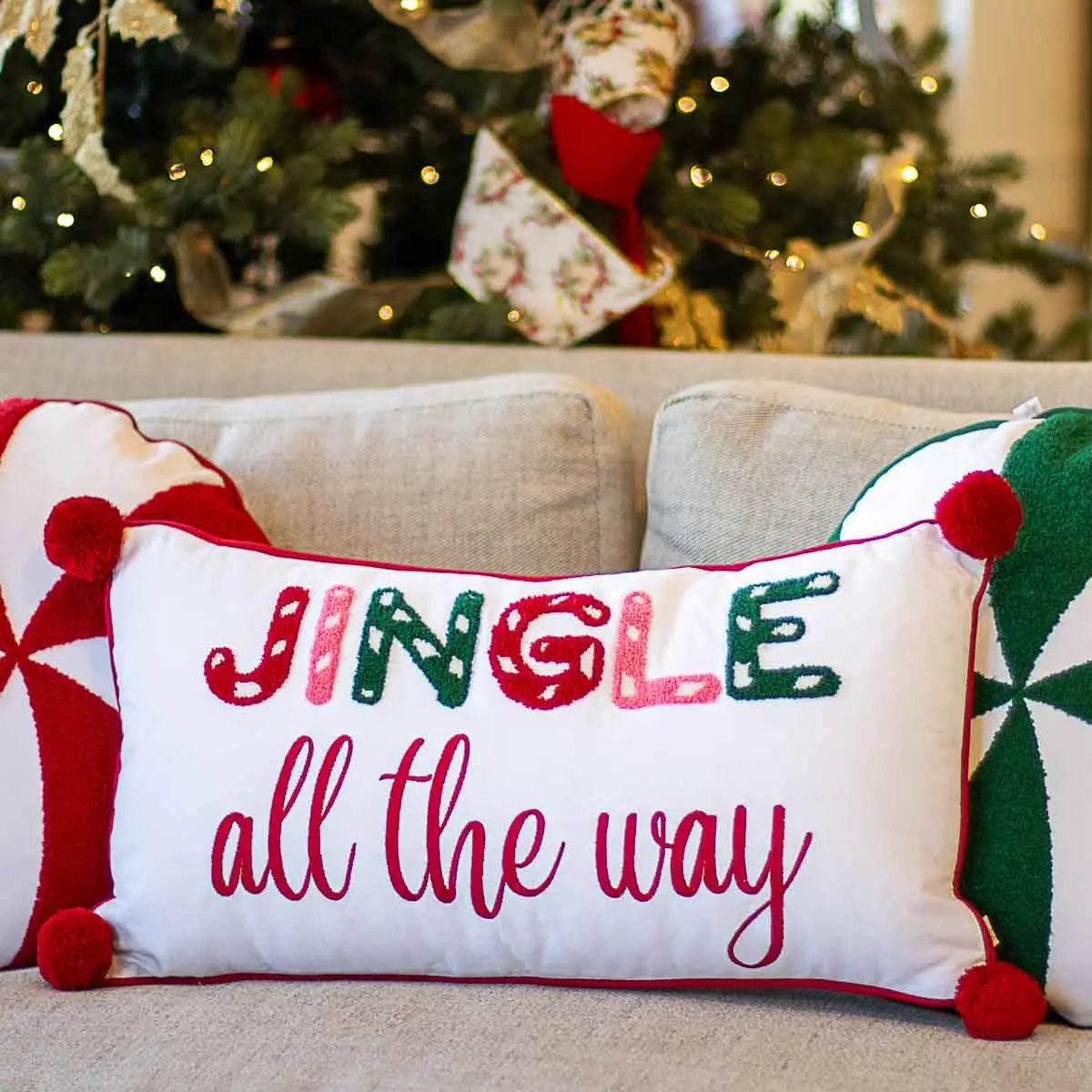 Jingle All the Way Lumbar Pillow with Pom Pom’s