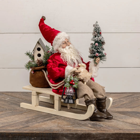 Santa on Sled with Red Coat